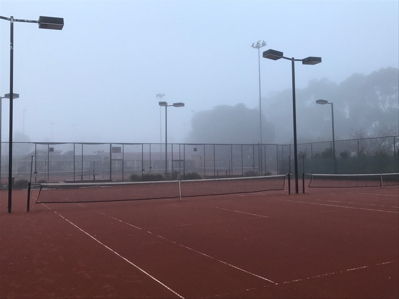 Courts in fog